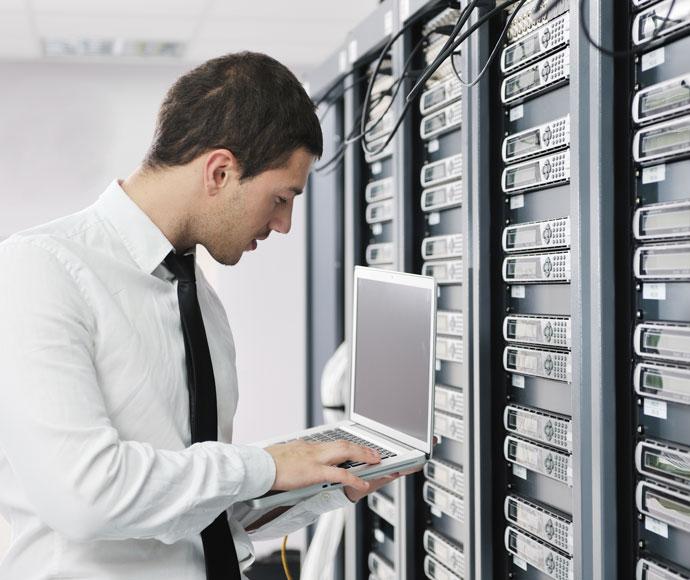 Man working next to server