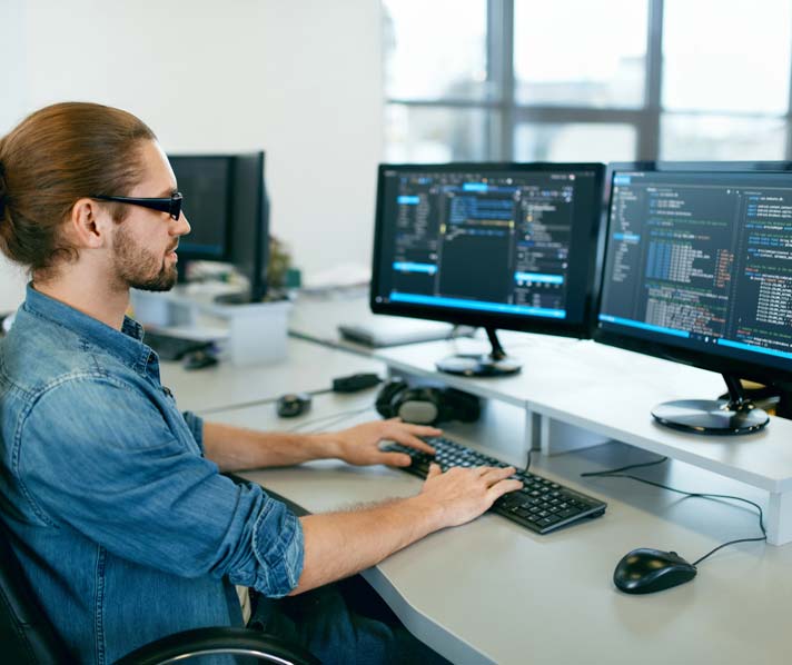 Software engineer on computer